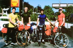 Photo of Concrad, Lee, Noel, and Norman at a gas station parking lot in San Rafael, CA